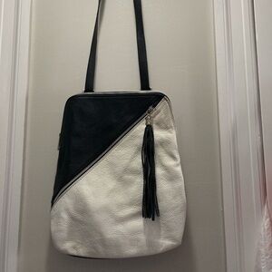Backpack/shoulder bag made of black and white genuine leather